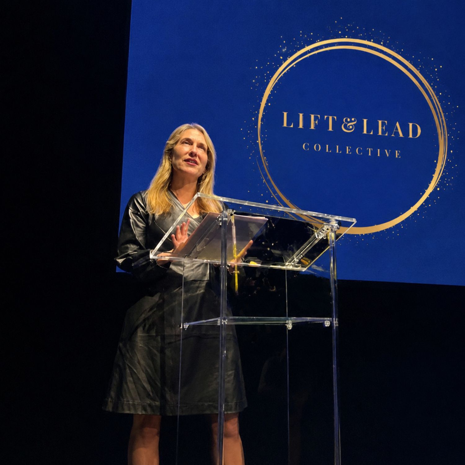 Laura speaking at a Lift & Lead Collective event